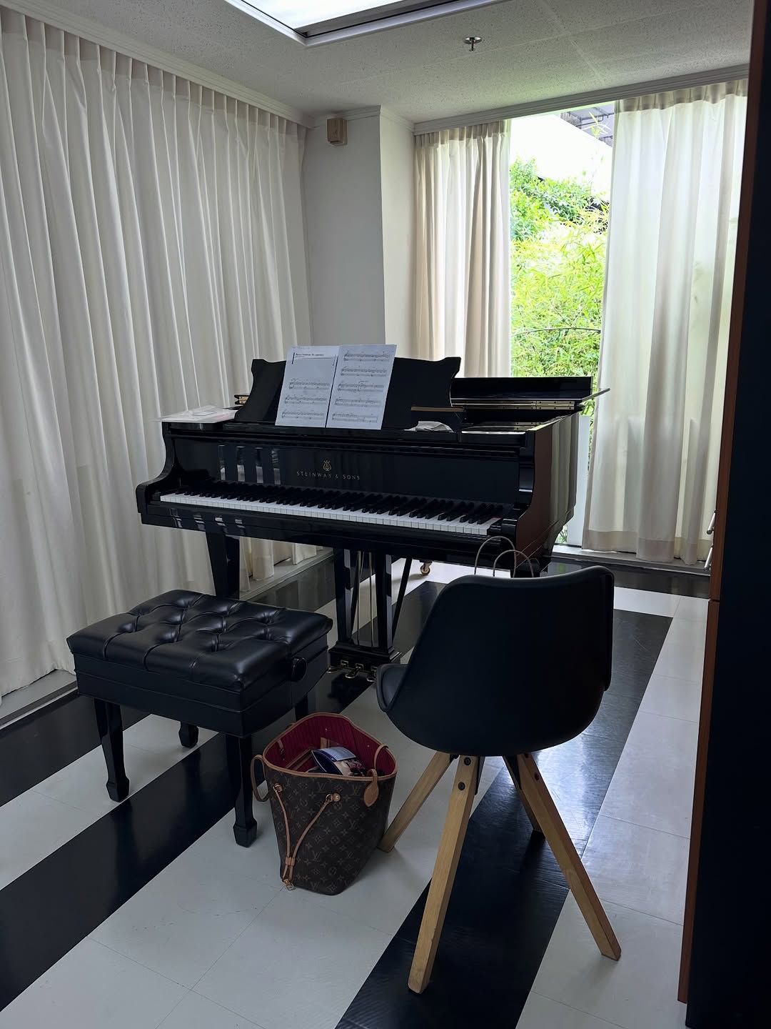 Playing a Steinway on her travels